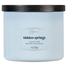 Light blue 3-wick scented candle in glass jar with black lid