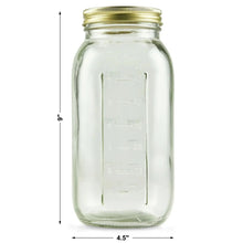 Half-gallon wide-mouth glass mason jar with gold lid and front measurement markings