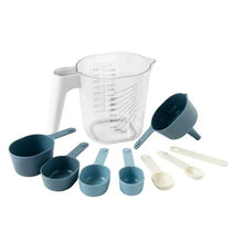 Blue 9-piece stackable measuring set with cups, spoons, and measuring pitcher