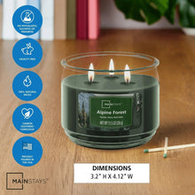 Green 3-wick scented candle in clear glass jar, Alpine Forest label, three flames