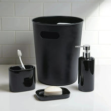 Black ceramic toothbrush holder with handle cutout and two toothbrush slots