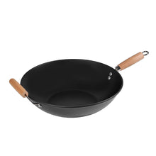 Black nonstick carbon steel wok with light wood handle and hanging loop