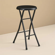 Black vinyl padded folding stool with round seat and curved metal legs