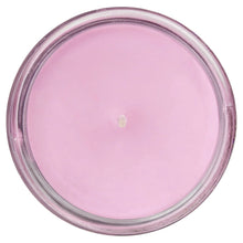 Top view of lilac wax inside round glass jar candle