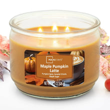 Lit glass jar candle with amber wax and Maple Pumpkin Latte label, three wicks