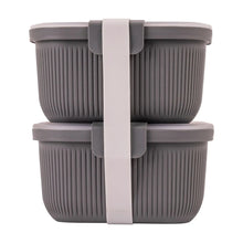 Grey ribbed plastic bento snack container set with two stacked lids and clasp strap