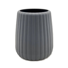 Grey ribbed toothbrush holder with open top, rubberized plastic cup