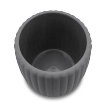 Grey ribbed toothbrush holder with dark interior base