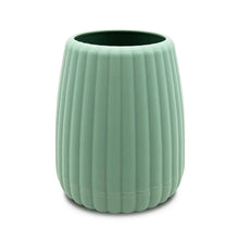 Green ribbed plastic toothbrush holder, cylindrical with wide opening