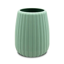 Green ribbed plastic toothbrush holder with wide open top, cup shape