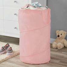 Pink pop-up spiral laundry hamper standing upright with open top