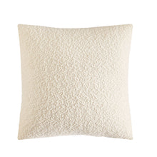 Ivory square boucle decorative pillow with textured fabric surface