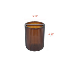 Brown plastic toothbrush holder cup, 3.23 in diameter and 4.25 in tall