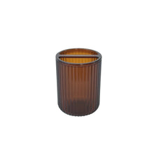Brown ribbed plastic toothbrush holder cup with open top