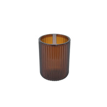 Brown plastic toothbrush holder cup with ribbed sides and open top