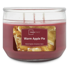 Mainstays Warm Apple Pie candle in clear glass jar, maroon wax, centered label