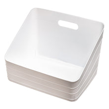 White plastic slanted storage bin with handle cutout