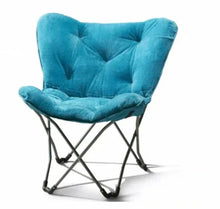 Blue folding butterfly chair with padded tufted back and seat, collapsible metal frame