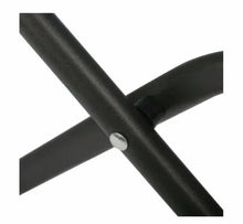 Black metal frame joint with round fastener on saucer chair