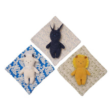 Pack of patterned baby burp cloths with plush animal rattles, including lion