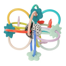 Infant loop rattle with teal flower handle, multicolor rings, and star attachments