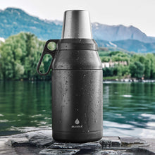 Black 64oz stack jug with stainless steel lid and carry handle, water-speckled finish