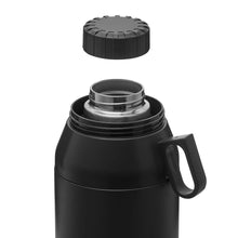 Manna 64oz stack jug in black with open lid and nested inner cup