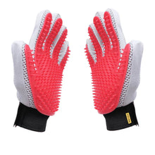 Pet grooming glove with red silicone shedding nubs, gray mesh back, black wrist strap