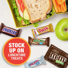 Assorted chocolate bar candies on tray: Snickers, Twix, Milky Way, 3 Musketeers, M&M’s