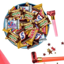 Assorted chocolate candy minis in a blue-and-white bowl