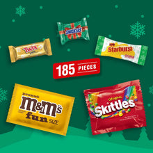 Christmas candy assortment with 185-piece label and wrapped Snickers, Twix, Starburst