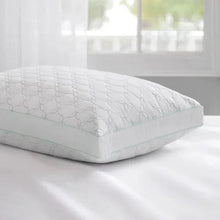 Quilted trellis-pattern decorative pillow, light white with mint trim and rounded edge