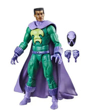 Green and purple armored action figure with yellow chest insignia, cape and masked head