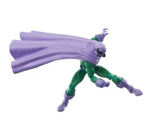 Green and purple action figure in running pose with long purple cape and spiked hands