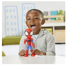 Spidey action figure on tabletop, red and blue suit with black spider emblem