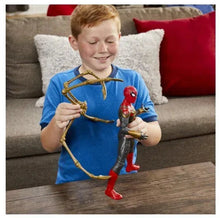 Child holding Spider-Man action figure with gold web-blaster arms and red suit