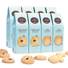 Mixed shortbread cookie assortment with light blue cartons and loose cookies