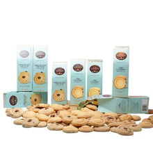 Shortbread cookie assortment with light blue cartons and assorted cookies in front