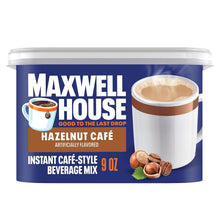 Hazelnut café instant beverage mix canister with Maxwell House branding, 9 oz