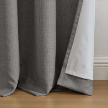 Gray curtain panel with sewn hem and weighted bottom edge