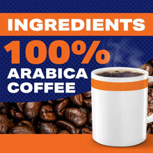 Coffee cup with orange-striped rim over roasted coffee beans, 100% arabica claim