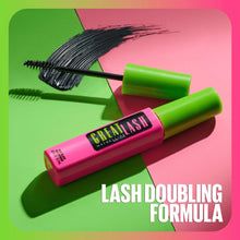 Mascara tube and wand with black bristle brush for lash definition