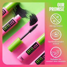 Mascara bottles with green caps and black brush, plus dark lash smudge.