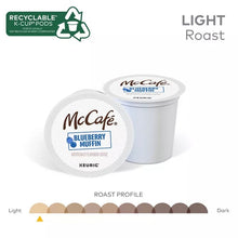 Light roast recyclable K-Cup pods with McCafé label, two white cups and lid