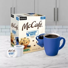 McCafé Blueberry Muffin K-Cup coffee box with blue mug and coffee pod