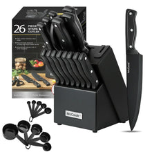 Black knife set with block and built-in sharpener, plus matching chef’s knife.