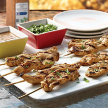 Caribbean jerk seasoning used on grilled chicken skewers with herbs