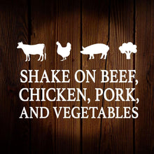 Wooden seasoning sign reading "Shake on beef, chicken, pork, and vegetables"