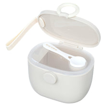 White baby formula storage container with hinged lid and scoop