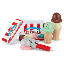 Ice cream play set with stacked wooden cones, scoop, and multicolor ice cream pieces